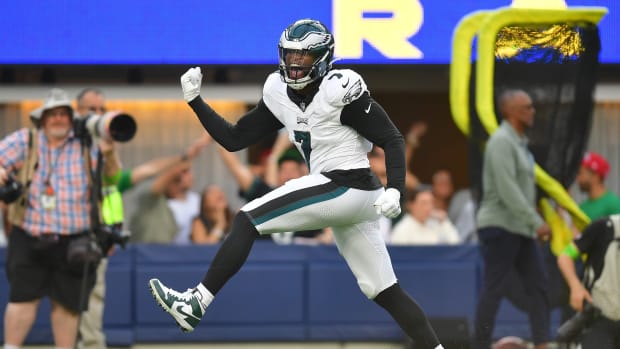 Philadelphia Eagles linebacker Haason Reddick (7) celebrates after sacking Los Angeles Rams quarterback Matthew Stafford (9) during the second half at SoFi Stadium. Mandatory Credit: Gary A. Vasquez-USA TODAY Sports